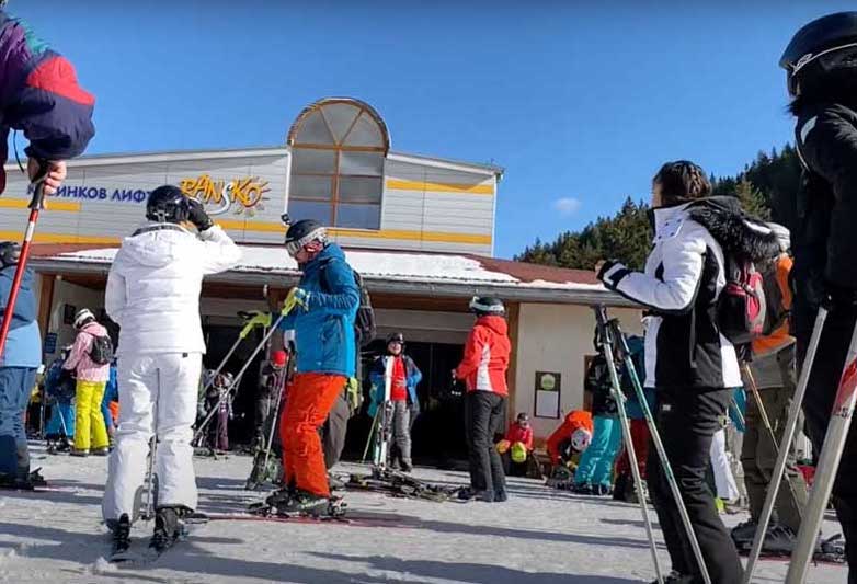 Skiers waiting for the ski lift