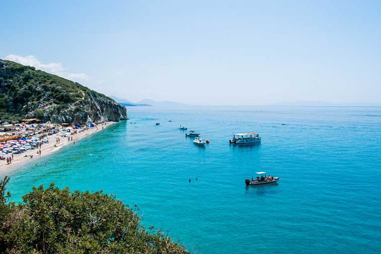 Jale and Gjipe beach, Albania - body of water and people sunbathing