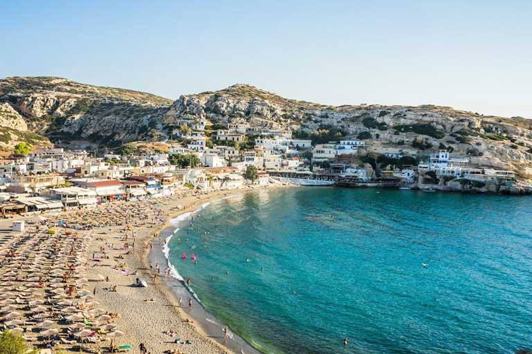 view of Matala beach and Matala village