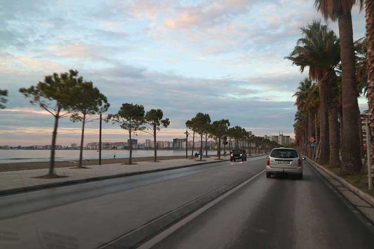 Vlore town's promenade with palm trees