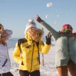 Bansko Skiing— three skiers on top of Pirin mountain