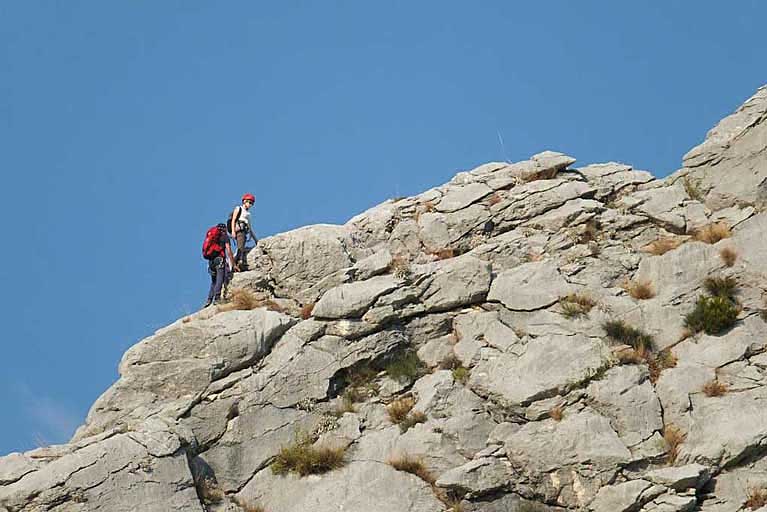 two people rock climbing near Cetina river, Omis