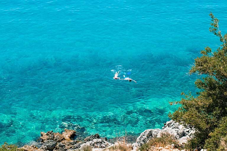 outdoor activities - a couple snorkelling in Himare