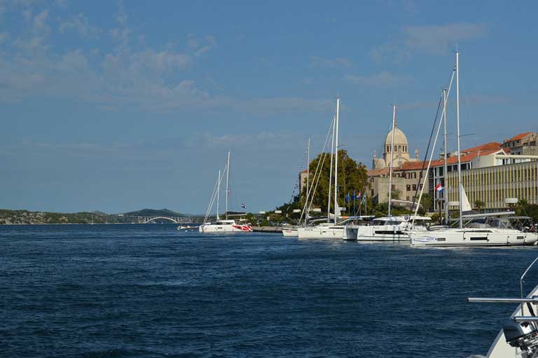 body of water sibenik port with yachts- rent a boat from Sibenik