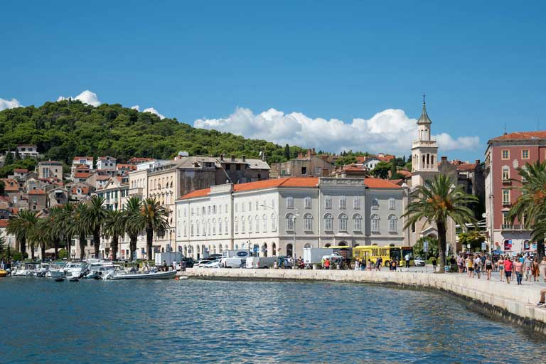 Split town with moored yachts- rent a yacht from Split