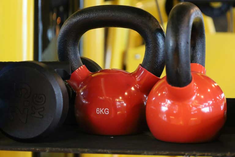 red dumbbells fitness place 