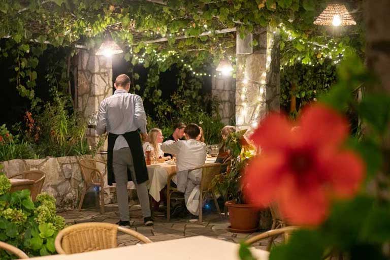 people having dinner at a restaurant on Vis Island