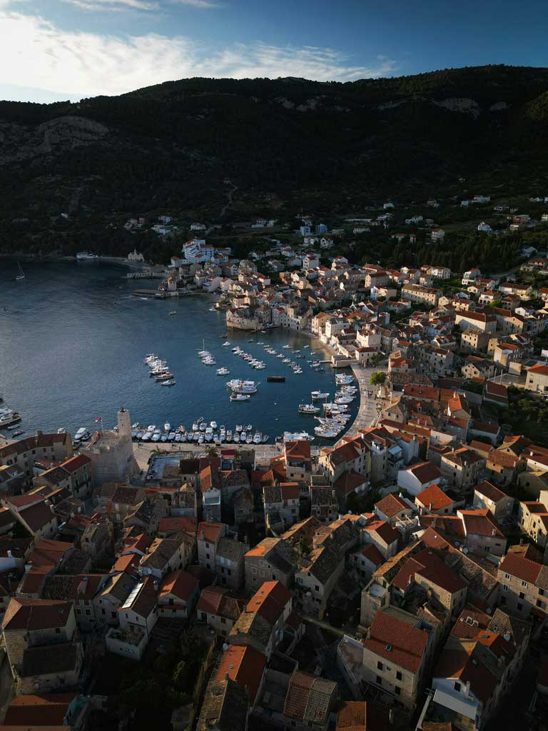 Komiza- aerial view of Komiza town and the harbour